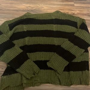 green and black striped sweater